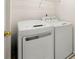 Laundry room featuring a stacked washer and dryer at 4805 Wilkie Nw Way, Acworth, GA 30102