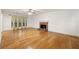 Bright, open living room featuring hardwood floors, fireplace, and natural light at 4805 Wilkie Nw Way, Acworth, GA 30102
