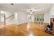 Spacious living room with hardwood floors, fireplace, and large windows at 4805 Wilkie Nw Way, Acworth, GA 30102