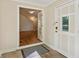 Foyer featuring stone floors and double doors leading into the living area at 2930 Winchester Dr, Cumming, GA 30041