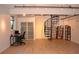 Finished basement with natural light, a spiral staircase, and ample storage at 172 Haynes Sw St # 107, Atlanta, GA 30313