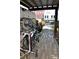 Modern bike rack with numerous bicycles near outdoor seating at 172 Haynes Sw St # 107, Atlanta, GA 30313