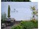 Picturesque outdoor patio area with seating and garden landscaping at 172 Haynes Sw St # 107, Atlanta, GA 30313