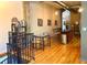 Loft-style living area adjacent to a modern kitchen, with exposed ducts and stylish furnishings at 172 Haynes Sw St # 107, Atlanta, GA 30313