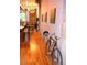 Open floor plan view highlighting hardwood flooring, exposed ductwork, and contemporary decor at 172 Haynes Sw St # 107, Atlanta, GA 30313