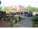 Community outdoor grilling area with seating, tables, and bbq grills at 172 Haynes Sw St # 107, Atlanta, GA 30313