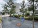 Inviting outdoor seating with tables and landscaping in a tranquil community space at 172 Haynes Sw St # 107, Atlanta, GA 30313