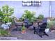 Inviting outdoor seating with Adirondack chairs surrounded by lush landscaping at 172 Haynes Sw St # 107, Atlanta, GA 30313