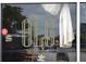 Storefront close-up featuring the 'OLG' logo and reflective window details of a southern eatery at 172 Haynes Sw St # 107, Atlanta, GA 30313