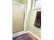 Bathroom featuring glass enclosed shower with neutral-toned walls and flooring at 2536 Caray Ne Ct, Lawrenceville, GA 30043
