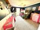 A colorful room with built-in bunk beds, pink dressers, and a study area at 2536 Caray Ne Ct, Lawrenceville, GA 30043