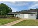 The exterior of the Westchester Swim and Tennis Club with manicured landscaping at 2536 Caray Ne Ct, Lawrenceville, GA 30043