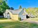 Lovely home with a two-car garage, well-maintained lawn, and mature landscaping at 2536 Caray Ne Ct, Lawrenceville, GA 30043