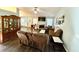 Open-concept living room with dark wood floors, cozy furniture, and a fireplace for a warm atmosphere at 2536 Caray Ne Ct, Lawrenceville, GA 30043