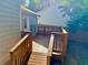 Elevated wood deck with stairs, great for enjoying outdoor meals and views at 2536 Caray Ne Ct, Lawrenceville, GA 30043