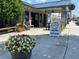 Bluetop restaurant with outdoor seating and lush floral arrangements creating a welcoming atmosphere for diners at 5300 Peachtree Rd # 3601, Atlanta, GA 30341