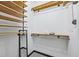 Walk-in closet with custom shelving and ample storage space, perfect for organizing clothes and accessories at 5300 Peachtree Rd # 3601, Atlanta, GA 30341