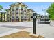 Modern condo building with visible rail trail signage, offering convenient access to nearby amenities and attractions at 5300 Peachtree Rd # 3601, Atlanta, GA 30341