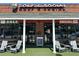 Golf & Social featuring outdoor seating, mini-golf, and a lively entertainment atmosphere in a central location at 5300 Peachtree Rd # 3601, Atlanta, GA 30341