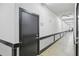 Long hallway with concrete floors and multiple storage units, offering ample storage space at 5300 Peachtree Rd # 3601, Atlanta, GA 30341
