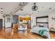 This open floorplan features a kitchen, living, and bedroom area with hardwood floors at 5300 Peachtree Rd # 3601, Atlanta, GA 30341
