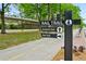 Scenic rail trail sign with walking path and lush green trees providing a nearby recreational area at 5300 Peachtree Rd # 3601, Atlanta, GA 30341