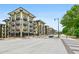 Street view of modern condo building, showcasing a contemporary design and appealing urban living with retail at 5300 Peachtree Rd # 3601, Atlanta, GA 30341