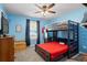A vibrant bedroom features a bunk bed, and a window with natural light at 60 Water Oak Trl, Covington, GA 30014