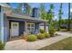 Inviting front porch with rocking chairs and stylish decor, perfect for relaxing outdoors at 60 Water Oak Trl, Covington, GA 30014