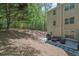 Spacious backyard with a patio area, ideal for outdoor gatherings and relaxation at 1076 Firethorne Pass, Cumming, GA 30040