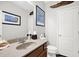 Cozy bathroom with single vanity at 1076 Firethorne Pass, Cumming, GA 30040