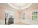 Bright dining room features a tray ceiling, and windows offering lots of natural light at 2795 Autumn Dr, Canton, GA 30115