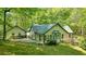 Beautiful view of the exterior showcasing the home's architecture and outdoor living space at 2795 Autumn Dr, Canton, GA 30115