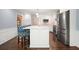 Bright kitchen with white cabinets, stainless steel appliances, and center island with barstool seating at 2795 Autumn Dr, Canton, GA 30115