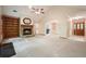 Spacious living room featuring a fireplace, vaulted ceilings, and views to the dining room at 2795 Autumn Dr, Canton, GA 30115