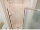 Shower stall with glass door and chrome fixtures at 2795 Autumn Dr, Canton, GA 30115