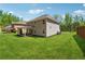 Expansive backyard showcasing a covered patio, perfect for outdoor living at 4050 Danbury Farms Dr, Cumming, GA 30040