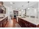 Well-equipped kitchen with a large island, modern appliances, and an open layout at 4050 Danbury Farms Dr, Cumming, GA 30040