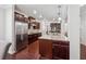 Modern kitchen with stainless steel appliances, granite countertops, and ample cabinet space at 4050 Danbury Farms Dr, Cumming, GA 30040