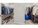 Organized walk-in closet with shelving and ample storage space at 4050 Danbury Farms Dr, Cumming, GA 30040