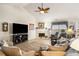 Inviting living room with a fireplace, comfortable seating, and ample natural light at 806 Village Pl, Loganville, GA 30052