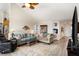 Inviting living room with comfortable seating, a decorative rug, and an open layout at 806 Village Pl, Loganville, GA 30052