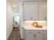 Bright kitchen with white cabinets, quartz countertops, and stainless steel appliances at 113 Iveybrooke Ln # 61, Alpharetta, GA 30009