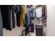 Walk-in closet with ample storage space and clothing racks at 130 Laguna Springs Dr, Woodstock, GA 30188