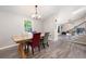 Elegant dining room with stylish decor, natural light, and wood floors, great for meals at 247 Shallowford Nw Rd, Kennesaw, GA 30144