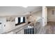 Bright living room featuring vaulted ceilings, a cozy window seat, and lots of natural light at 247 Shallowford Nw Rd, Kennesaw, GA 30144