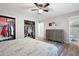 Main bedroom featuring an ensuite bathroom, walk-in closet, and lots of storage space at 247 Shallowford Nw Rd, Kennesaw, GA 30144