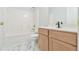 Bathroom features a tub, vanity, and marble floors at 6125 Brookechase Ln, Norcross, GA 30093