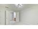 View of bedroom with ensuite bath featuring neutral decor at 6125 Brookechase Ln, Norcross, GA 30093
