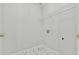 Laundry room with white marble floors and wire shelf at 6125 Brookechase Ln, Norcross, GA 30093